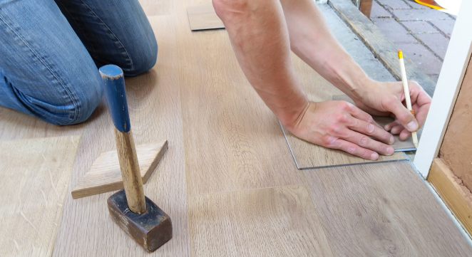cut and measure flooring plank in doorway